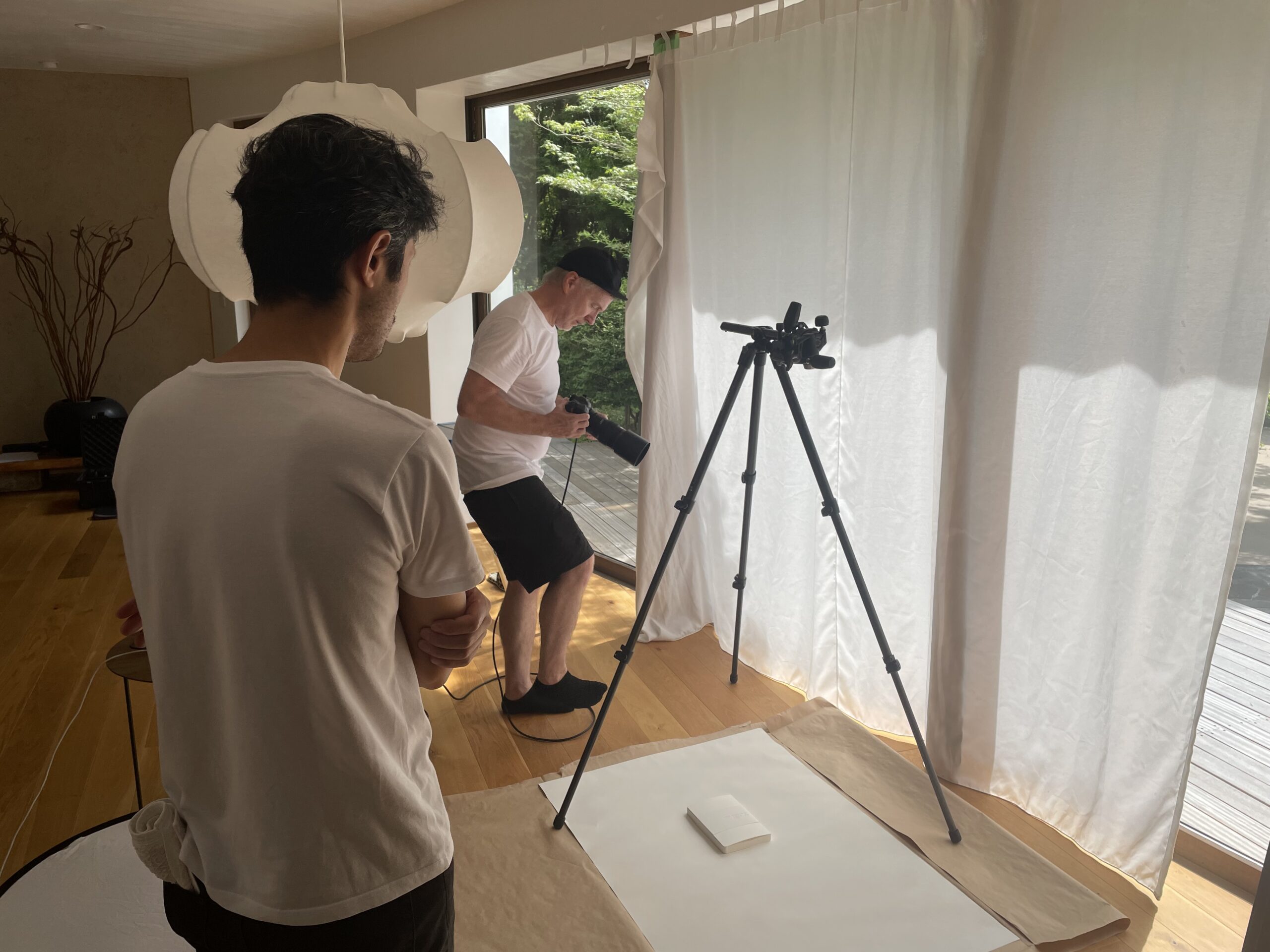 Martin and Masumi getting the tripod set up for photographing the notebook