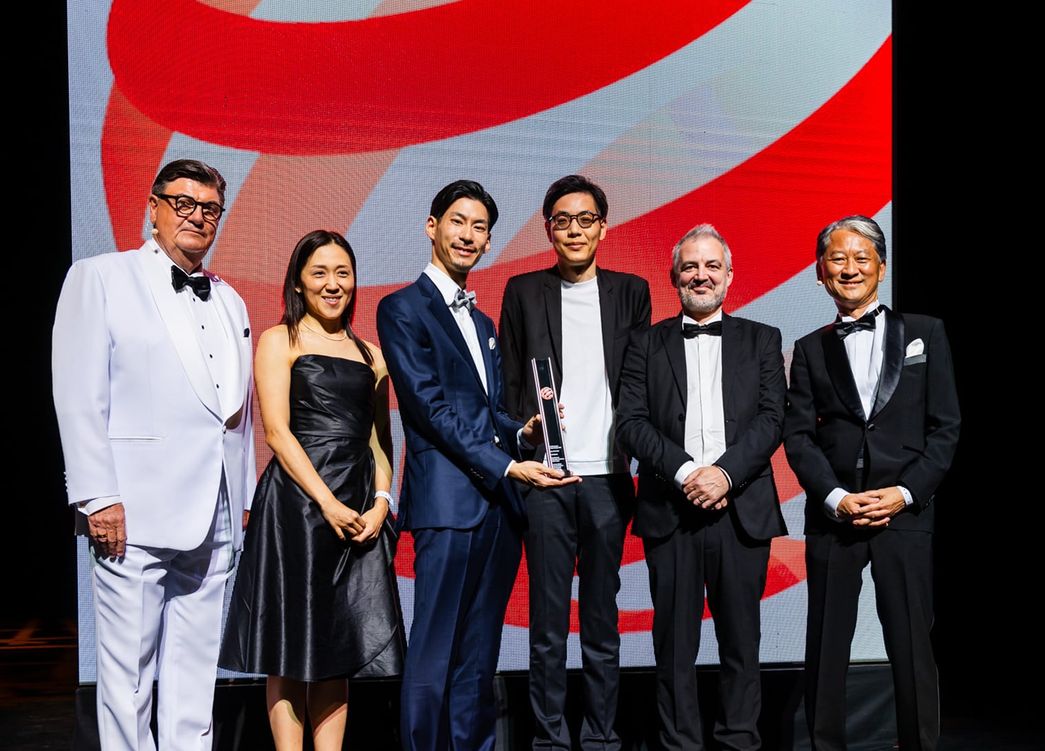 The iA Team receiving the Red Dot “Best of the Best” Award for Product Design 2025.